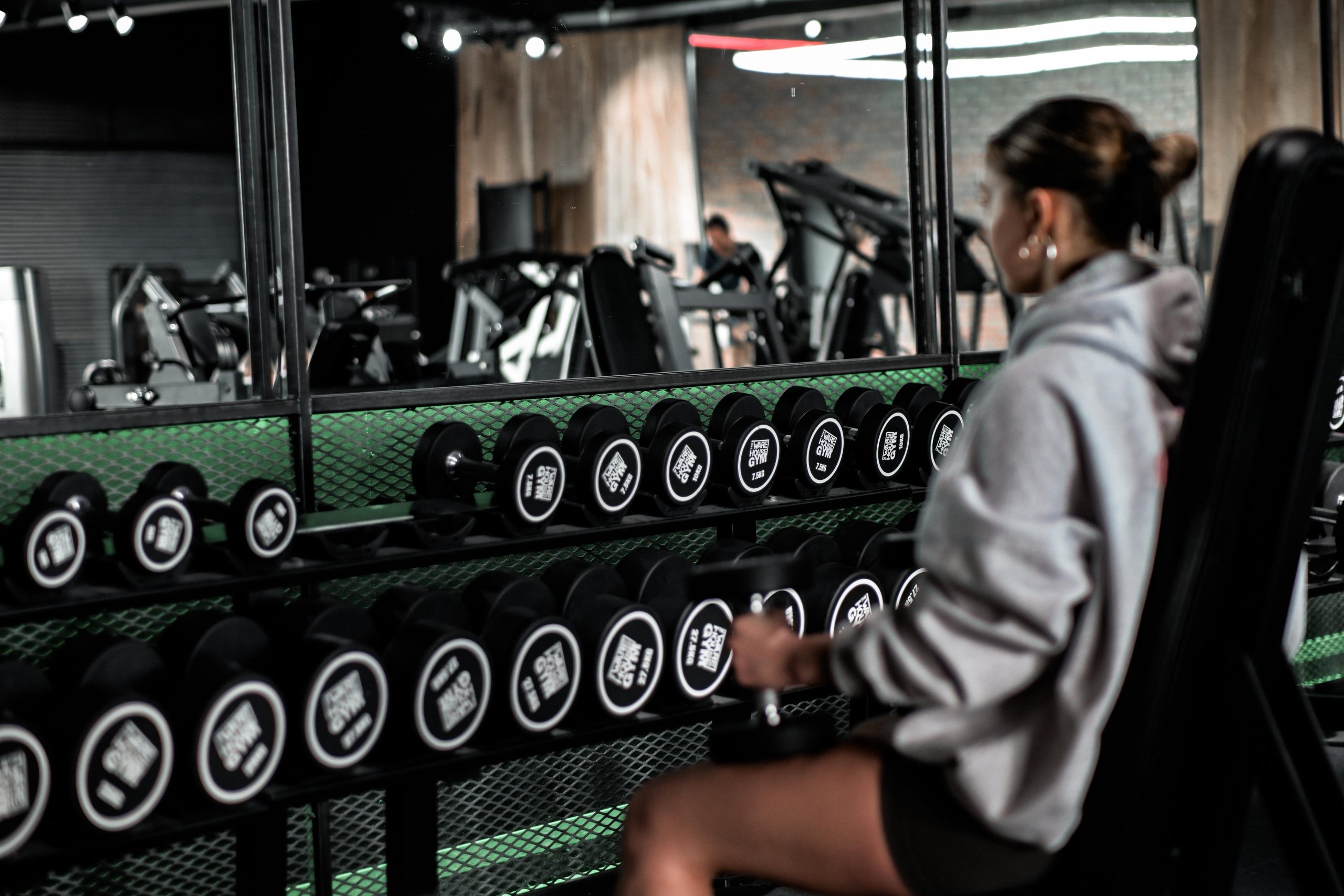 Athlete completing a demanding full-body workout in a well-equipped gym